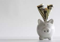 Piggy bank for cost of dental implants in Downers Grove