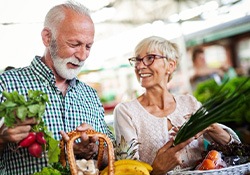 Older couple at the farmer’s market shopping