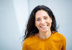 a woman smiling with dentures in Downers Grove