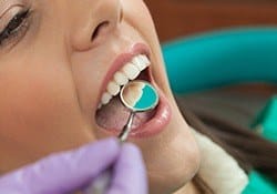 Patient receiving dental restoration