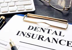 dental insurance form on table